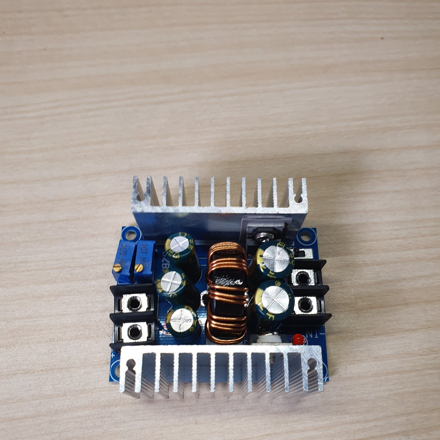 300W 20A DC-DC Buck Converter module used for stepping down voltage, featuring both constant current (CC) and constant voltage (CV) adjustment.#6241