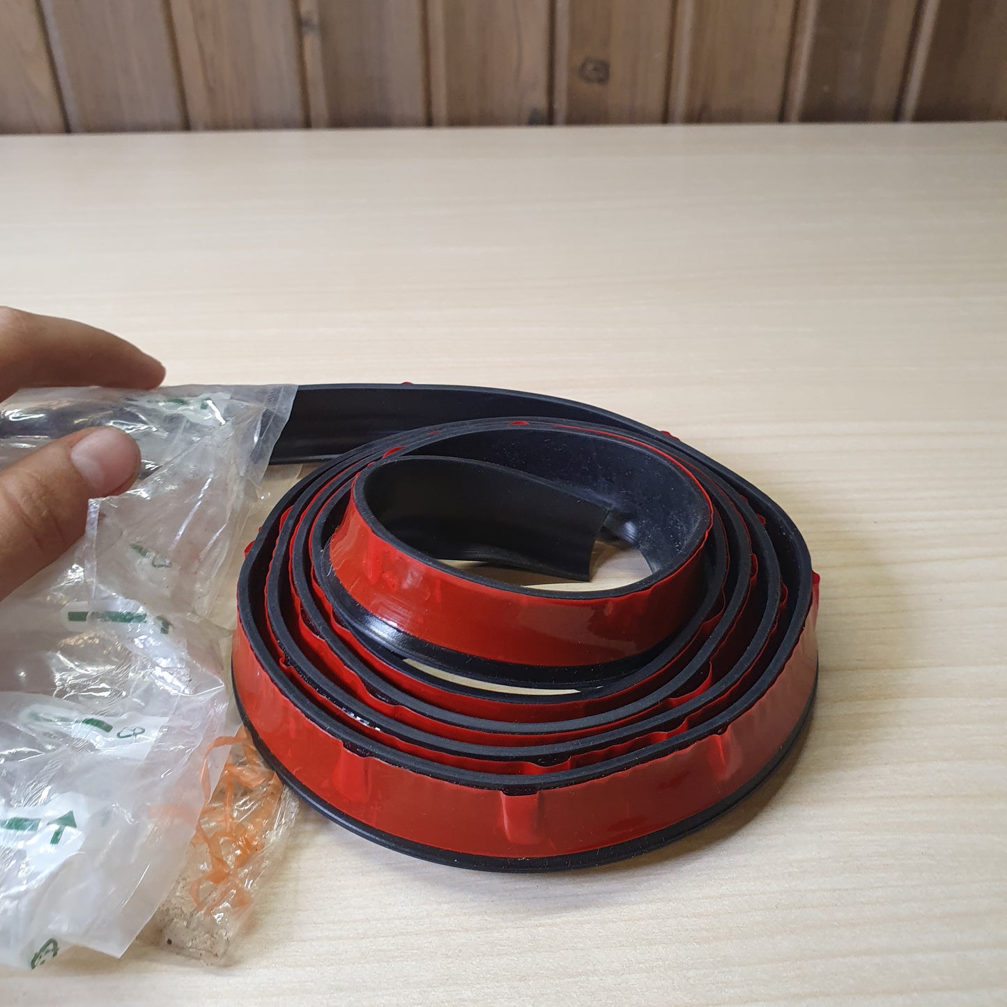 Flexible rubber strip used for various vehicle protection or sealing applications. #6725