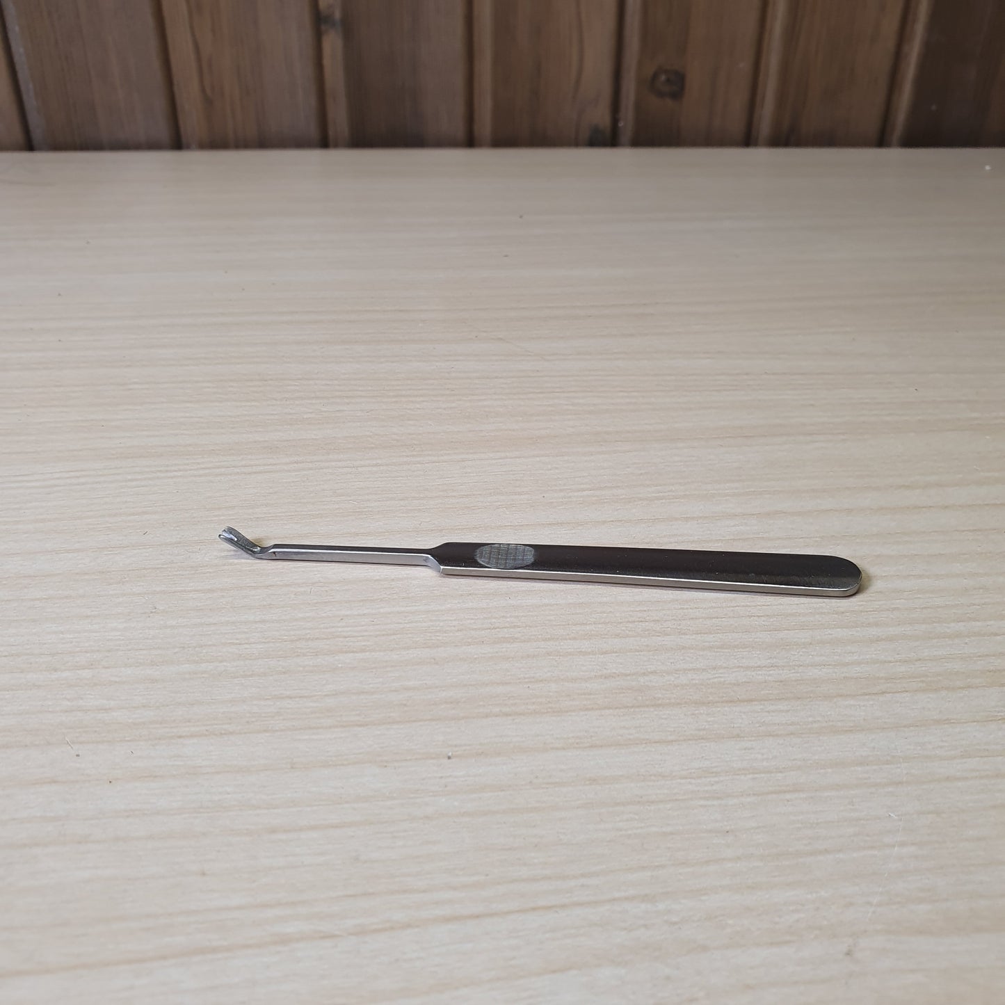 Steel cuticle pusher and trimmer, designed for removing dead skin and cuticles during manicures or pedicures. #6970