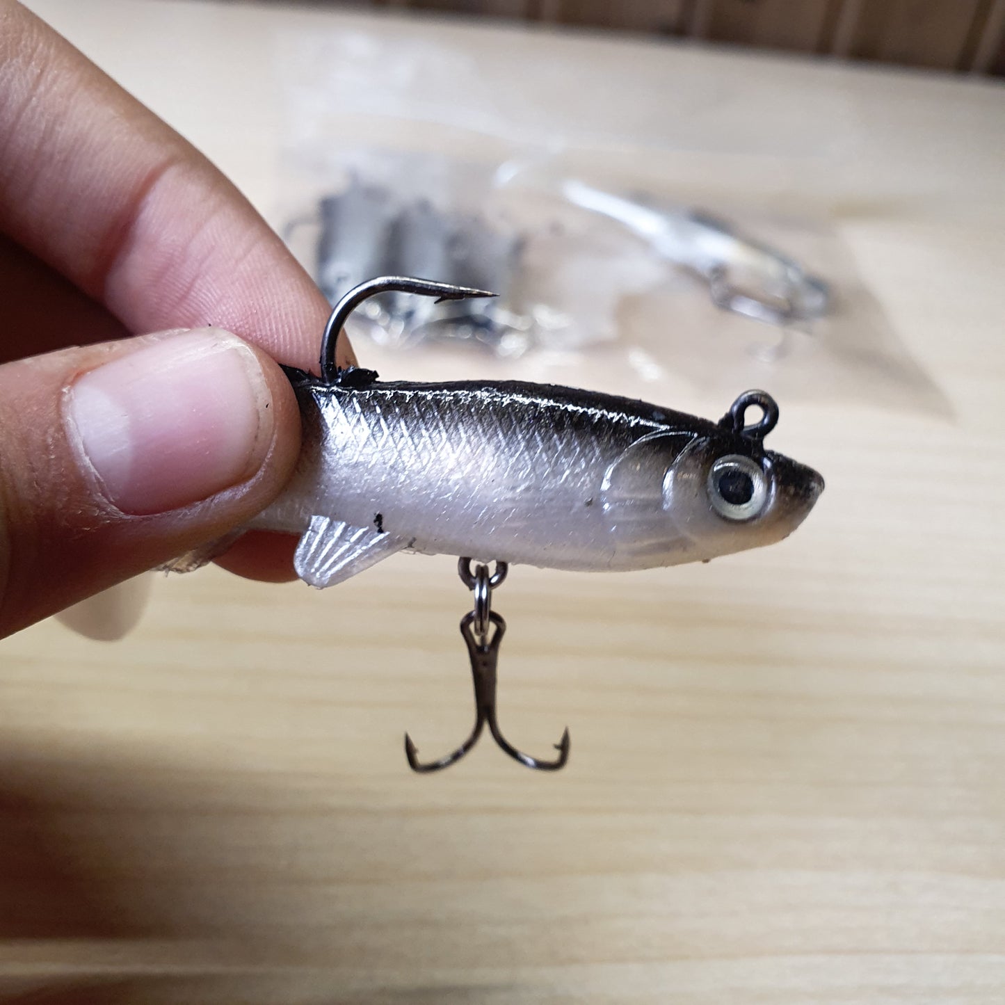 Soft PVC fishing lure with a bionic fish shape, lifelike 3D eyes, and realistic scale design.#6873