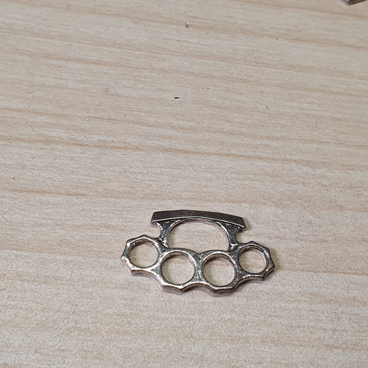 Brass knuckle dusters, often used for jewelry making or crafting #6993