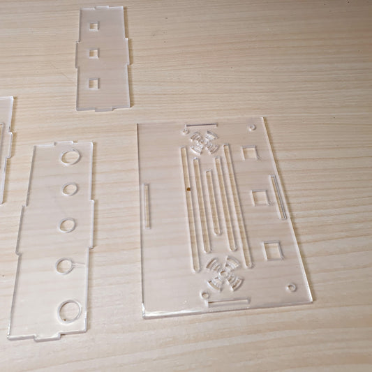 DIY assembly kit featuring precision-cut transparent acrylic panels.#8075