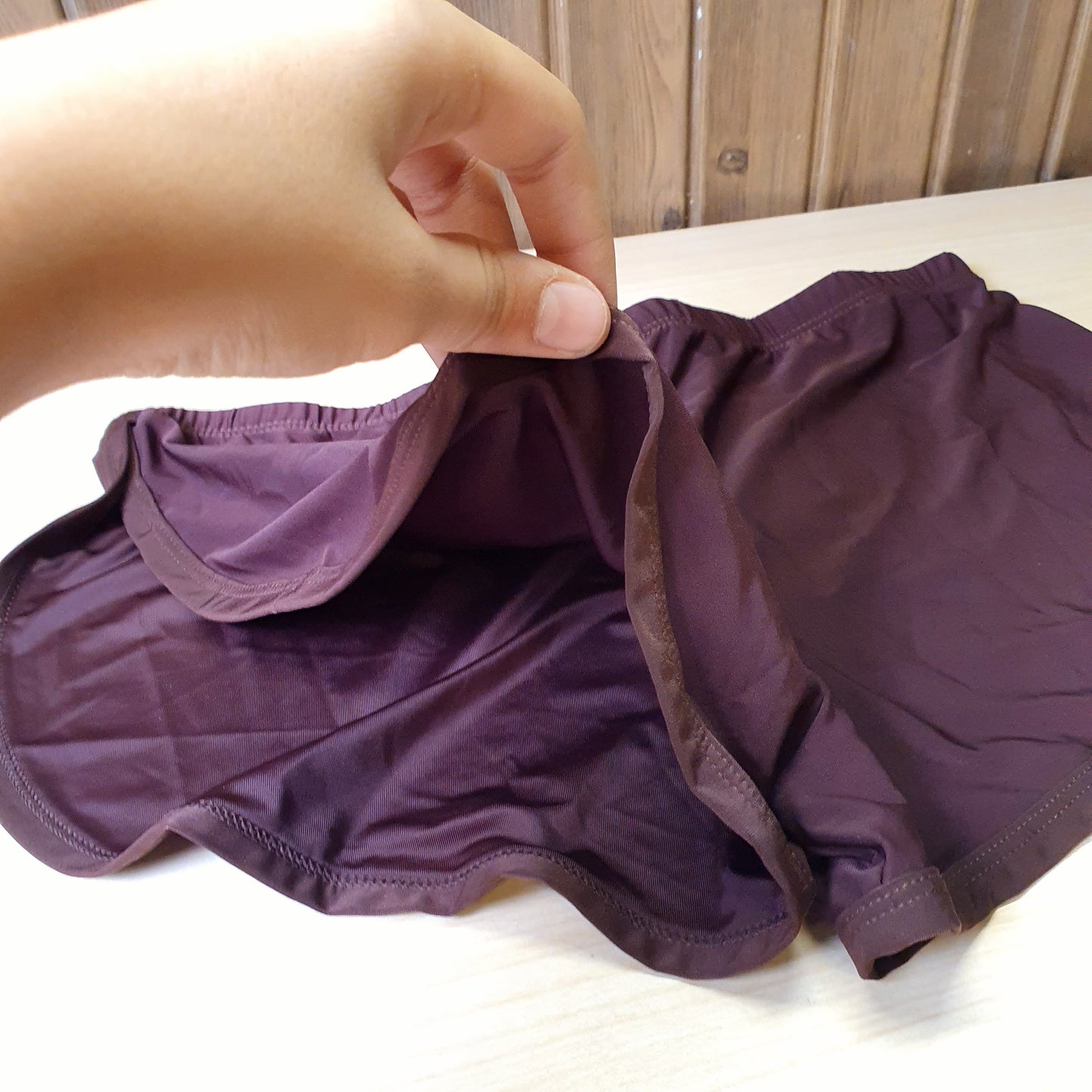 Deep plum active shorts feature a lightweight, stretchy fabric designed for movement.#8332