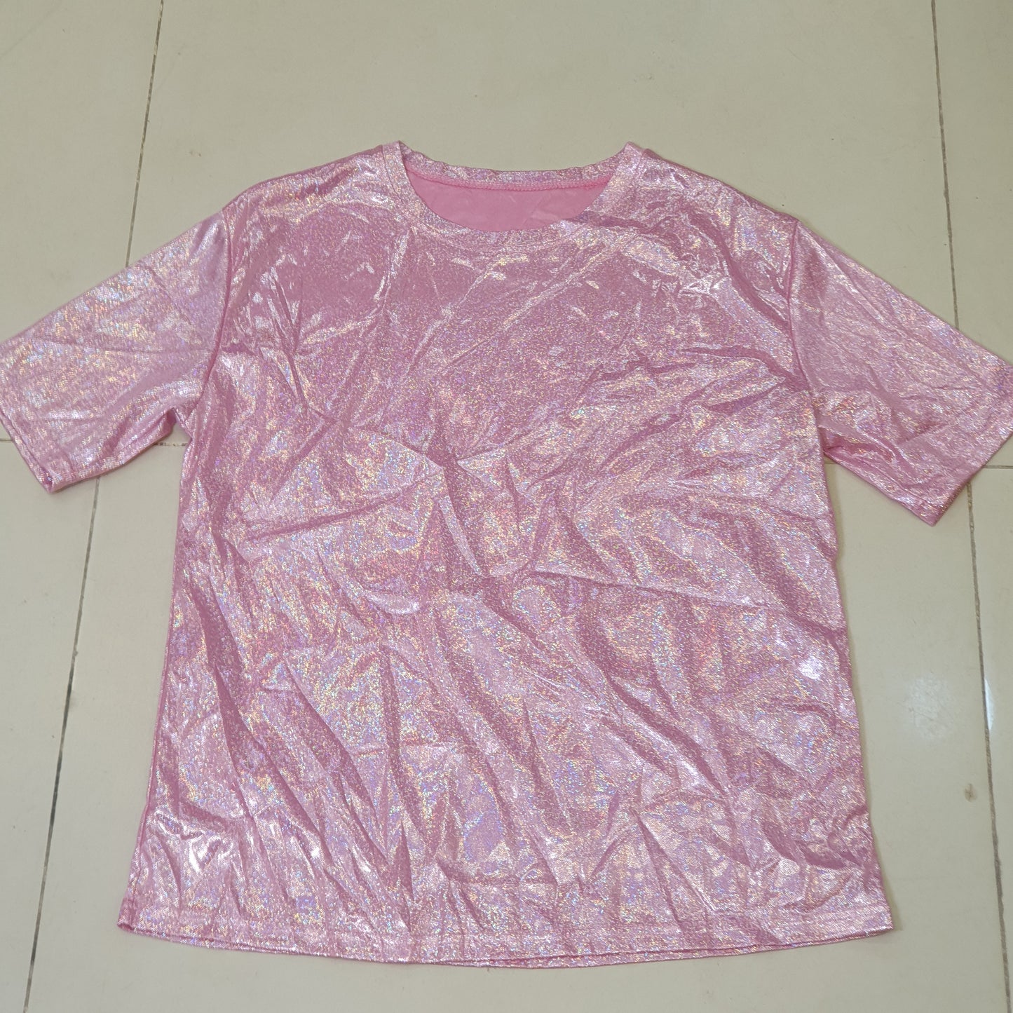 Pink top resembles a shiny holographic shirt #9115