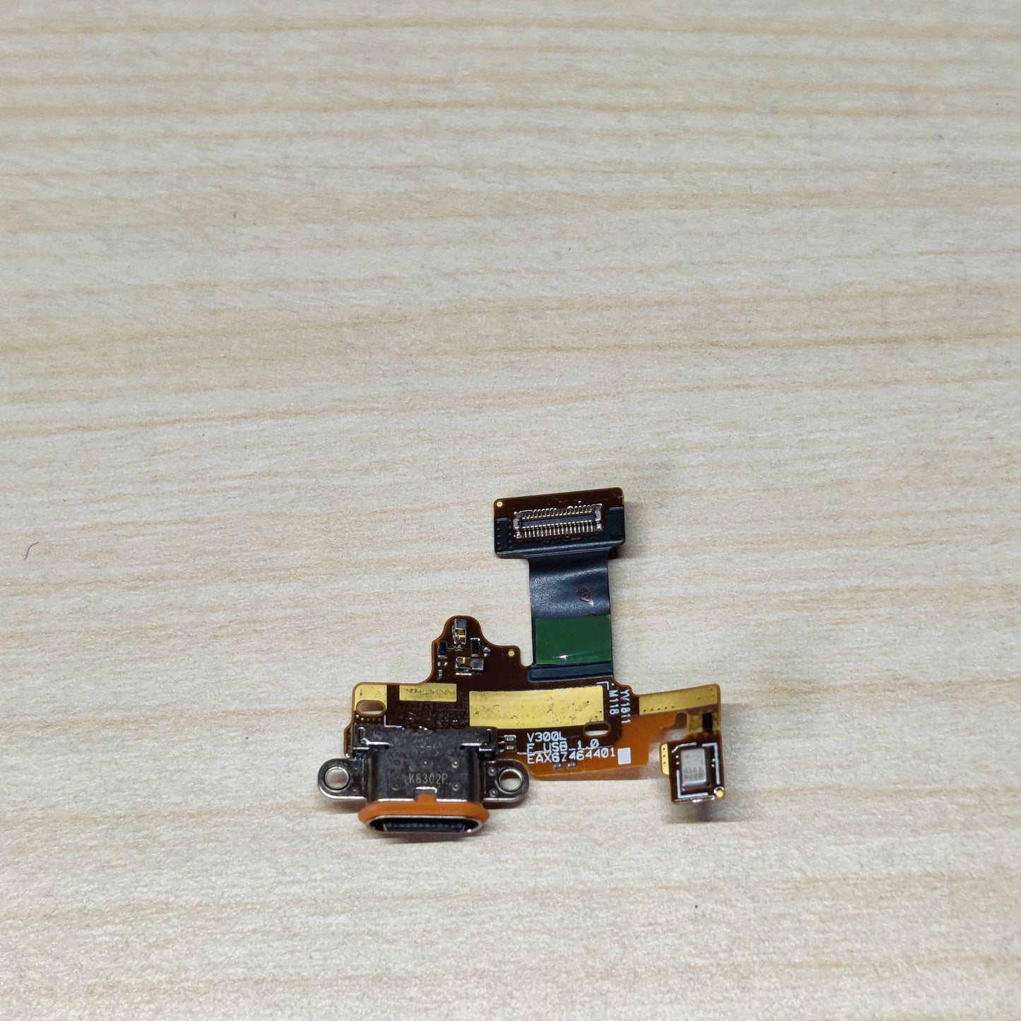 USB charging port flex cable assembly designed for the LG V30 smartphone.#2370