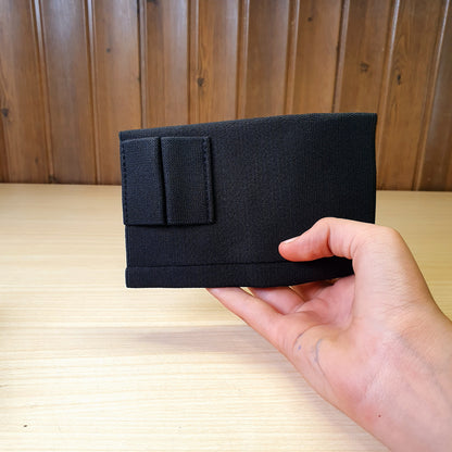 Black elastic tactical ammunition carrier is designed to hold shotgun shells or rifle cartridges for quick reloading #3264