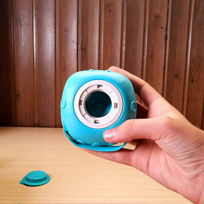 Blue silicone bath body brush featuring a built-in soap dispenser for convenient showering. #3353