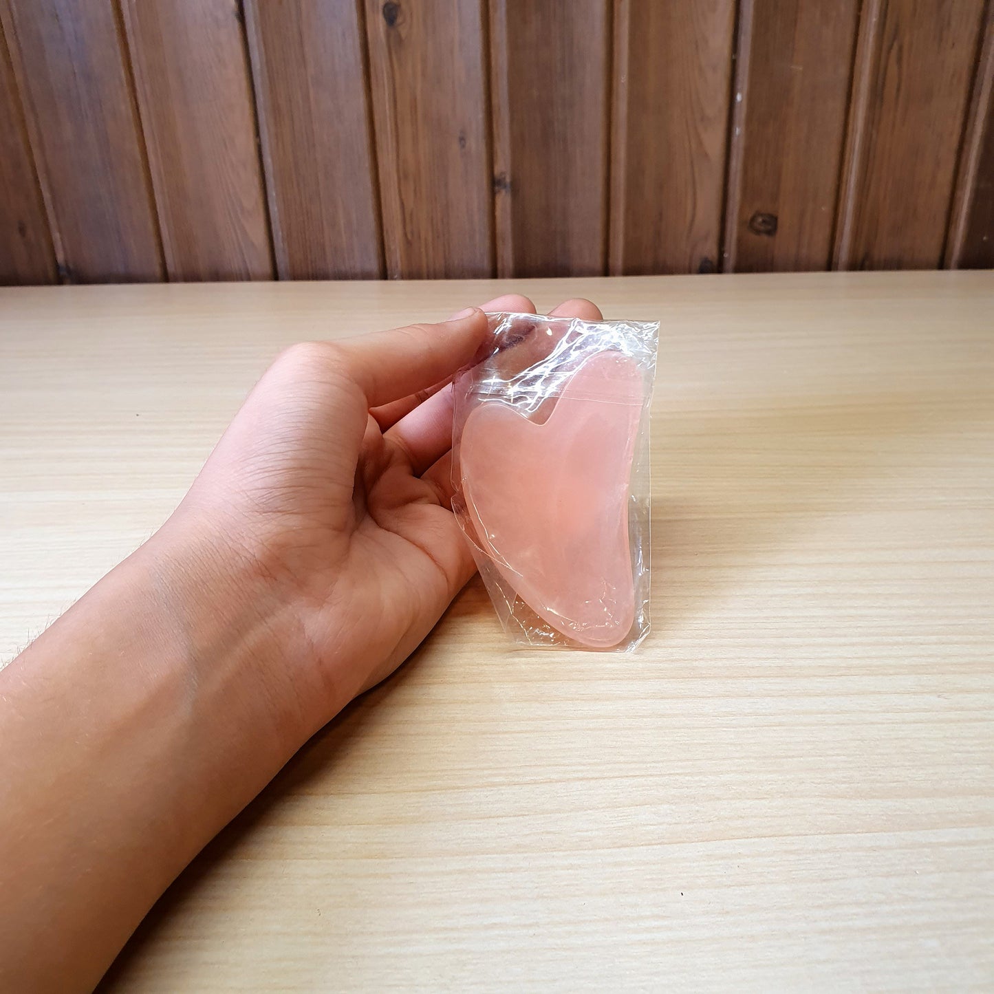 Pink, heart-shaped tool is a Gua Sha scraper, For Facial #3474