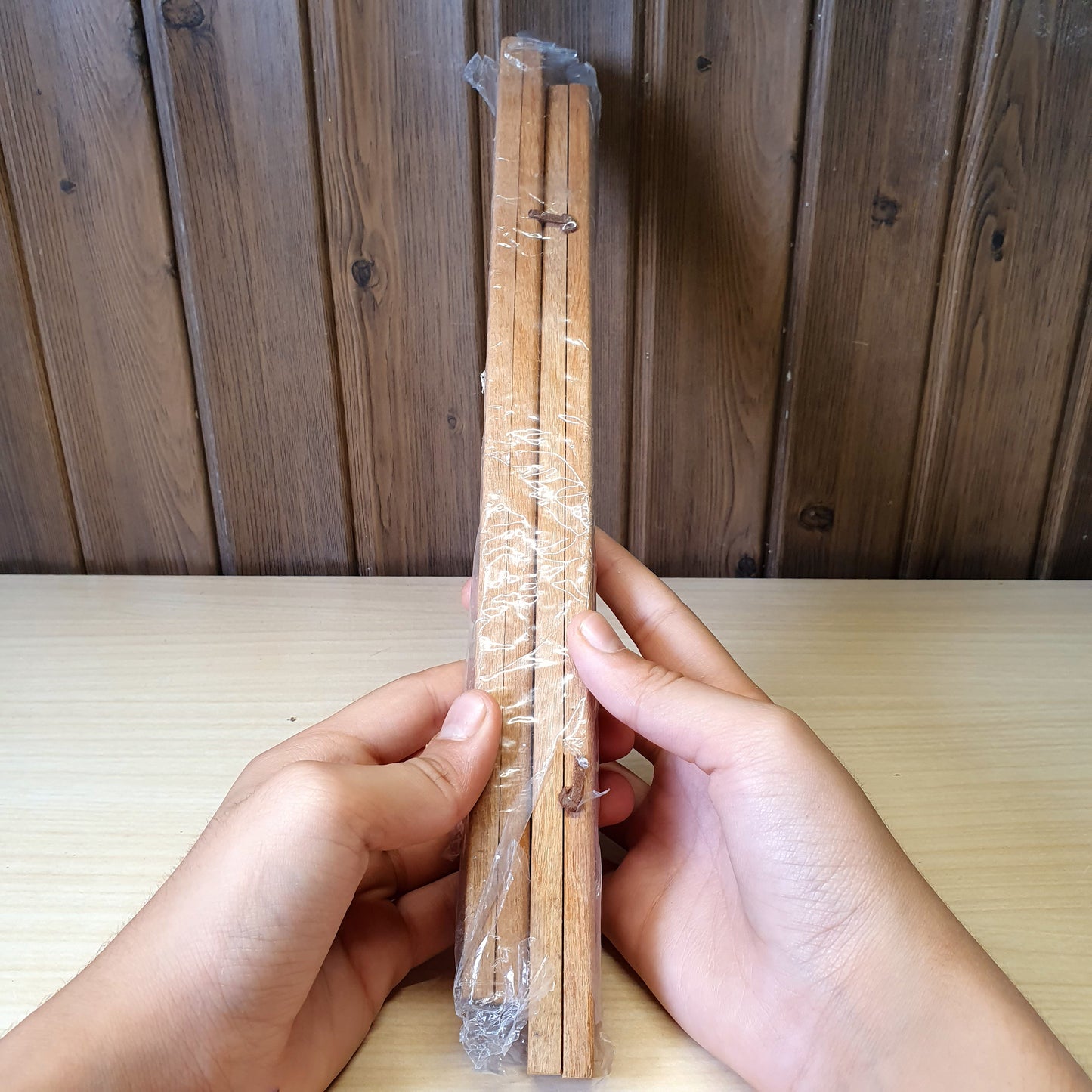 Magnetic wooden print hangers utilize hidden magnets to clamp onto artwork.#4145