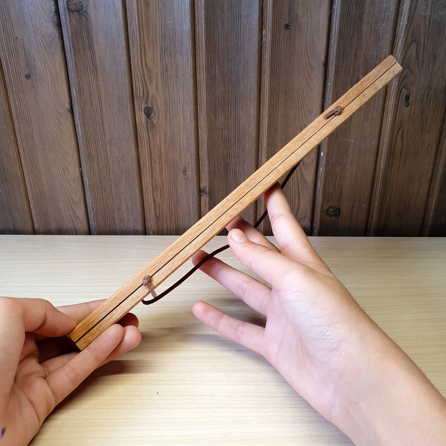 Magnetic wooden print hangers utilize hidden magnets to clamp onto artwork.#4145