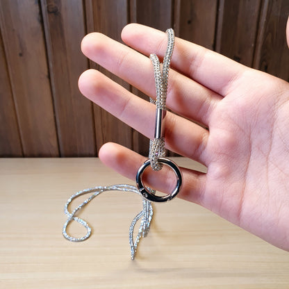 Silver Soleebee rhinestone lanyard features a sturdy metal clasp and keyring for securing IDs or keys #.4008