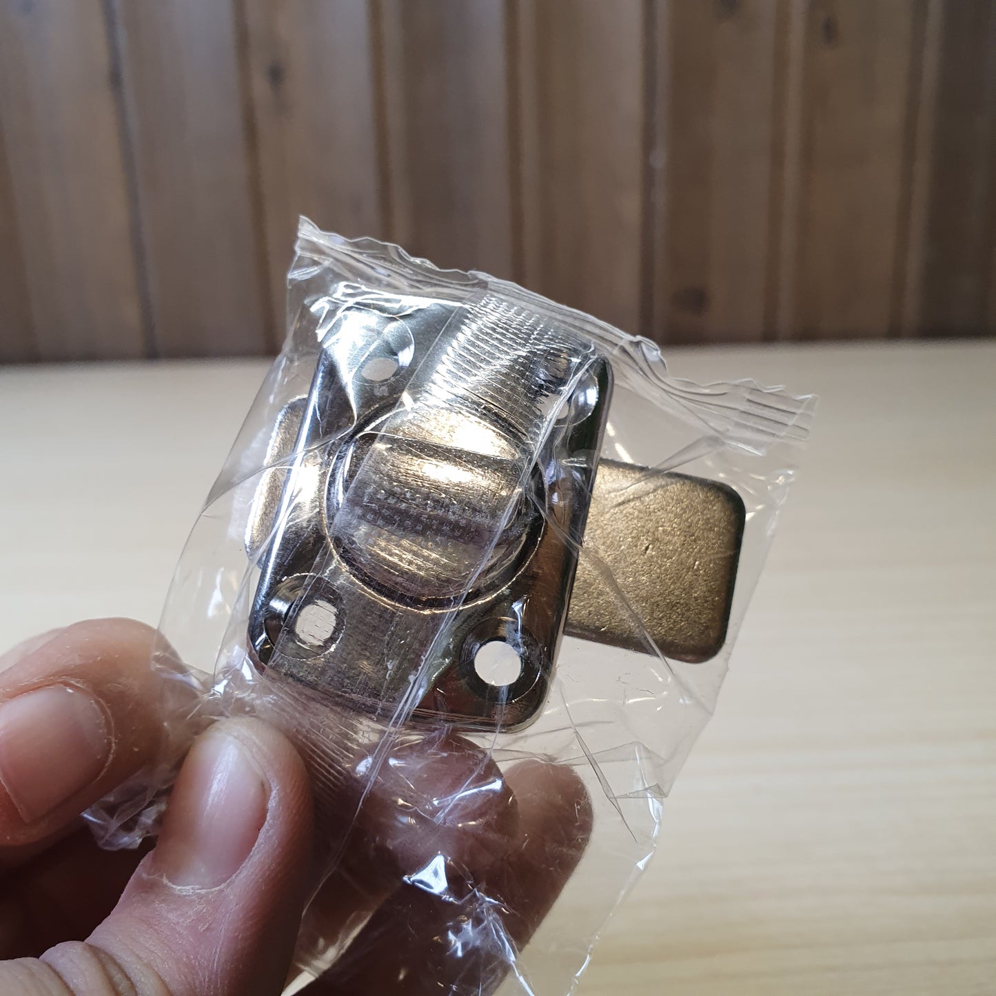 Rotating bolt latch, frequently used for securing small doors, cabinets, or chests. #6372