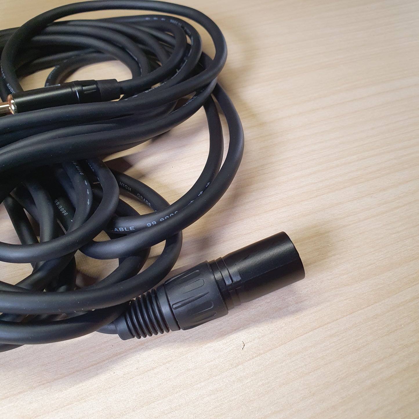 professional audio cable featuring a female XLR connector on one end and a 1/4" (6.35mm) mono jack plug on the other.#6167