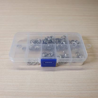 Metal snaps and fastener components, often used for sewing clothing or crafting.#6182