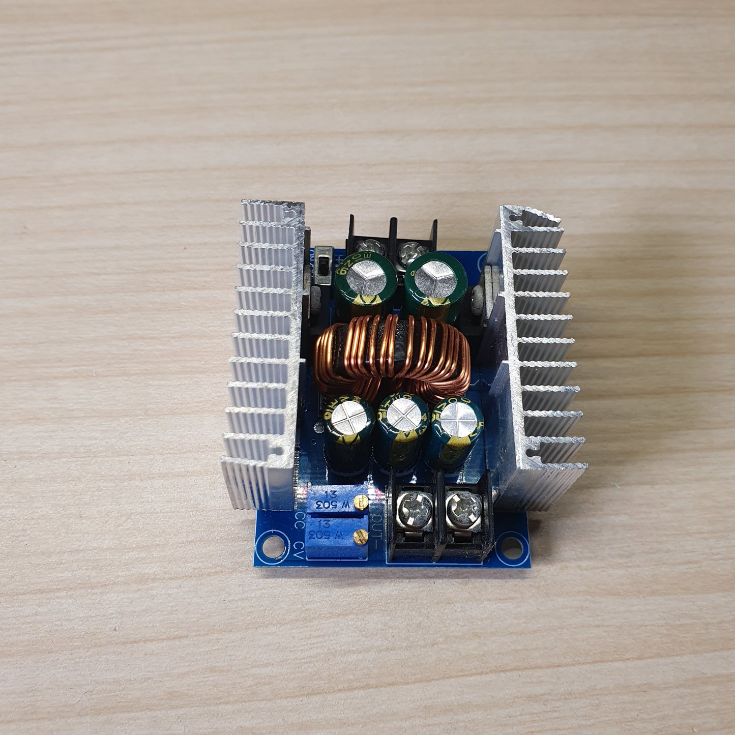 300W 20A DC-DC Buck Converter, a module designed to step down voltage from a higher input (6-40V) to a lower, adjustable output (1.2-36V).#6066