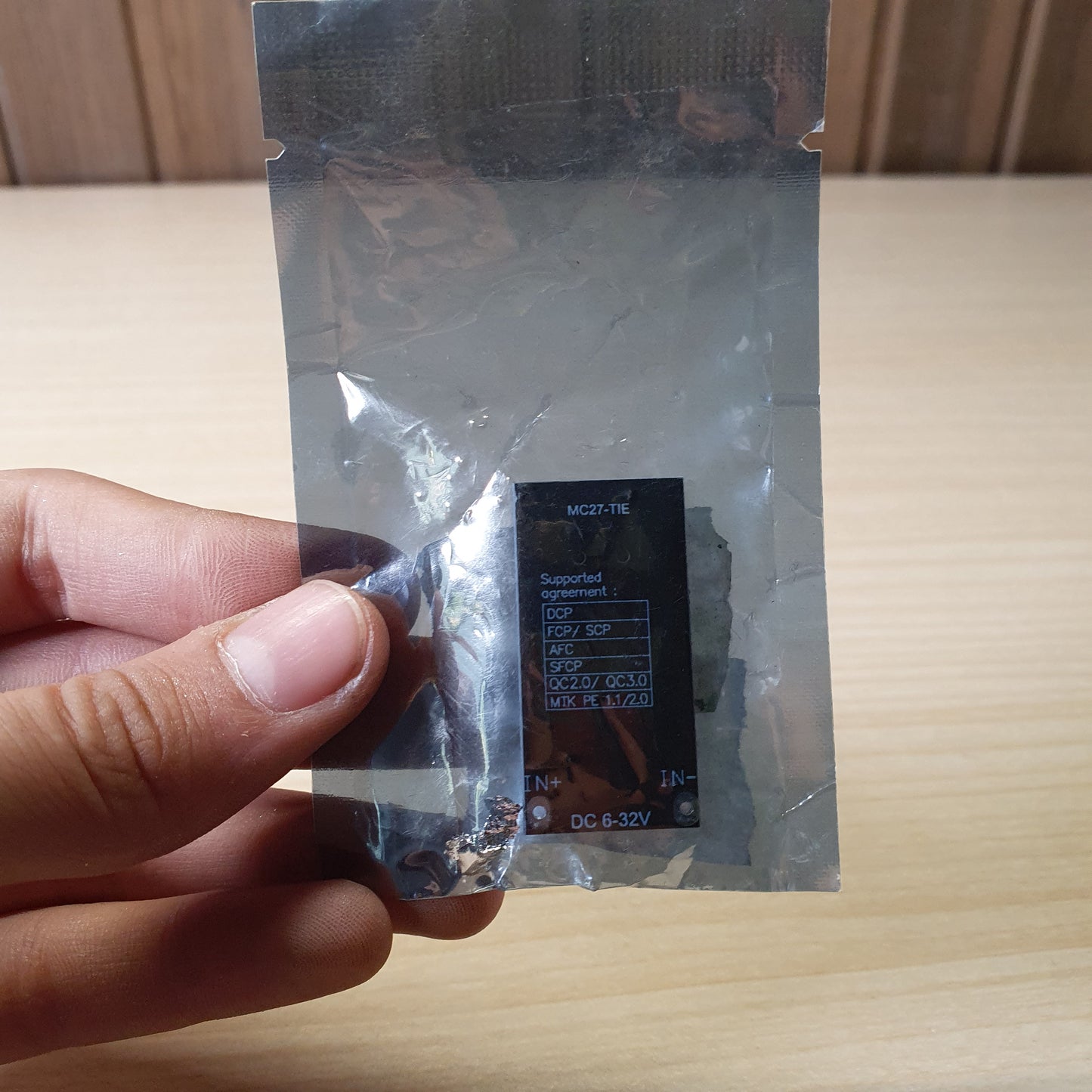 DC buck converter charging module, likely the MH-KC24 model, designed to step down higher input voltages (6V-32V) to a standard 5V USB output. #6380