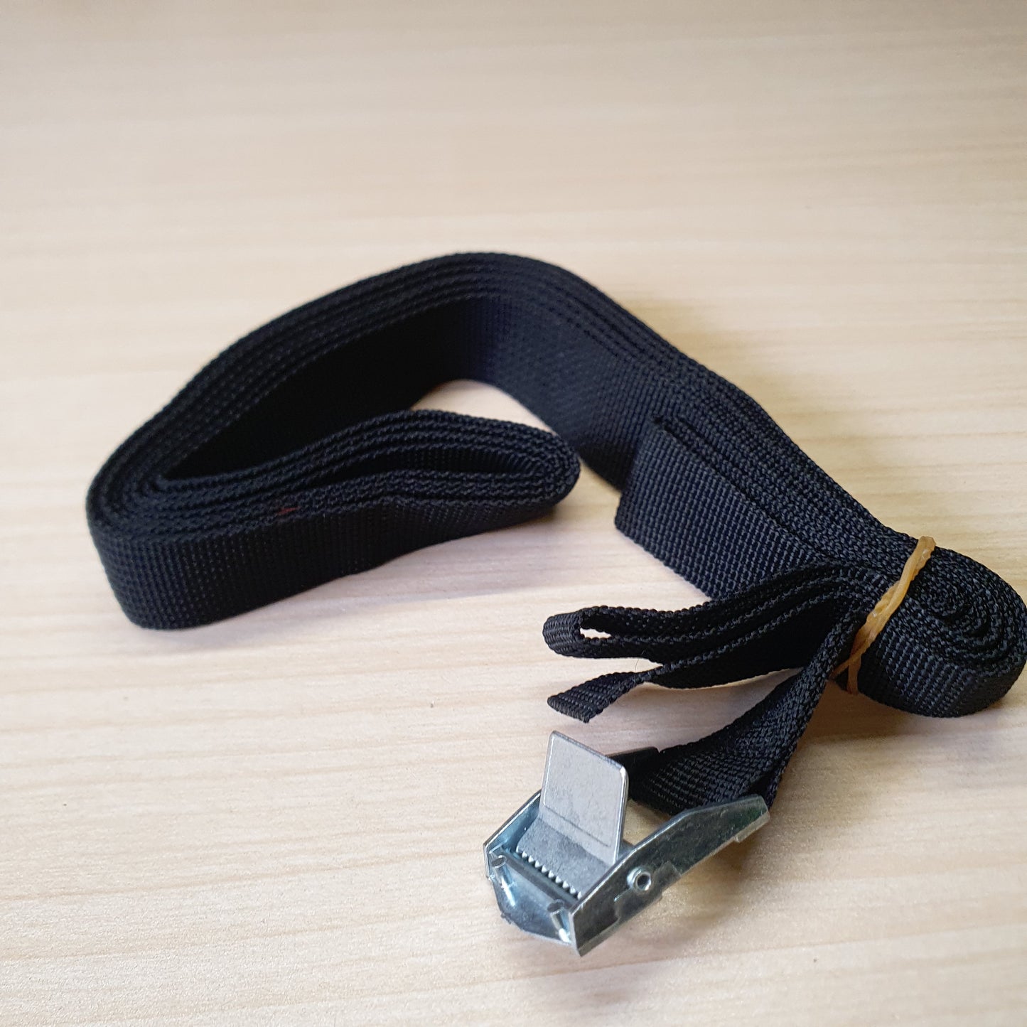 heavy-duty polyester lashing strap designed for securing cargo on vehicles or bundling items. #6614