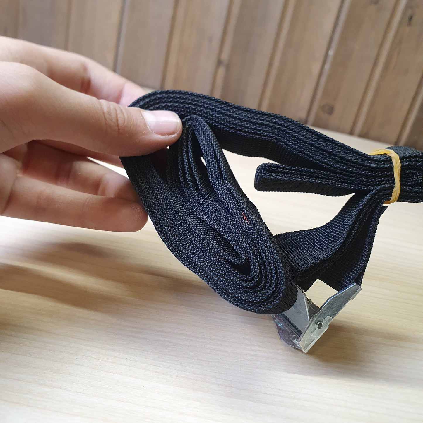 heavy-duty polyester lashing strap designed for securing cargo on vehicles or bundling items. #6614