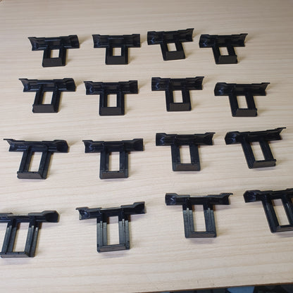 Plastic water drainage clips designed to prevent water accumulation, dirt, and dust buildup on solar panels. #6962