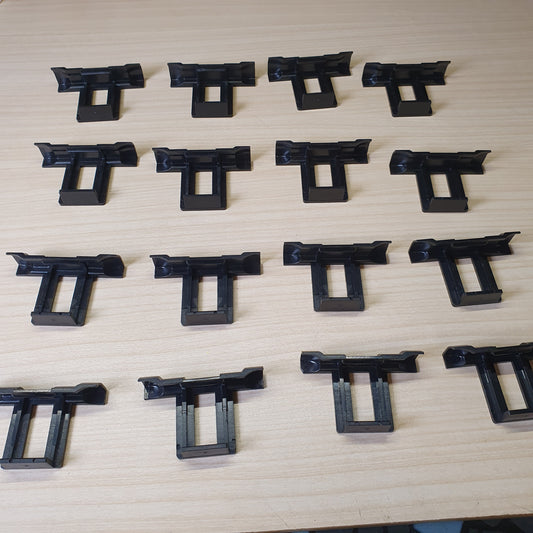 Plastic water drainage clips designed to prevent water accumulation, dirt, and dust buildup on solar panels. #6962