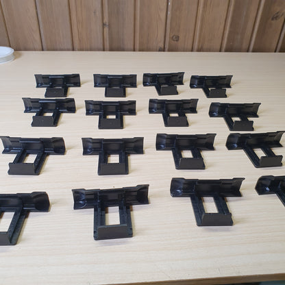 Plastic water drainage clips designed to prevent water accumulation, dirt, and dust buildup on solar panels. #6962