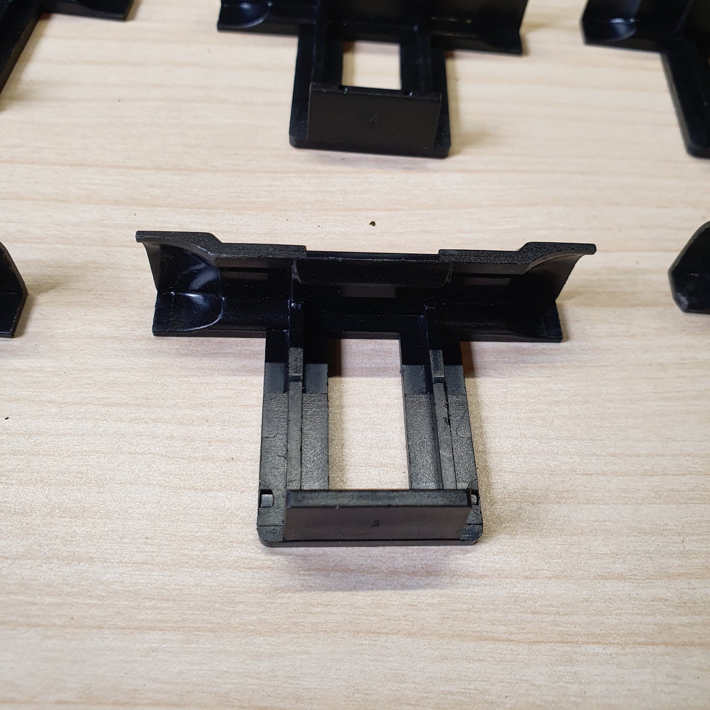 Plastic water drainage clips designed to prevent water accumulation, dirt, and dust buildup on solar panels. #6962