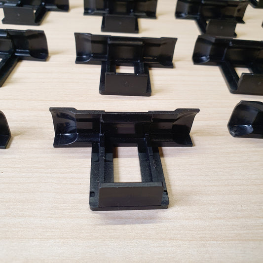 Plastic water drainage clips designed to prevent water accumulation, dirt, and dust buildup on solar panels. #6962