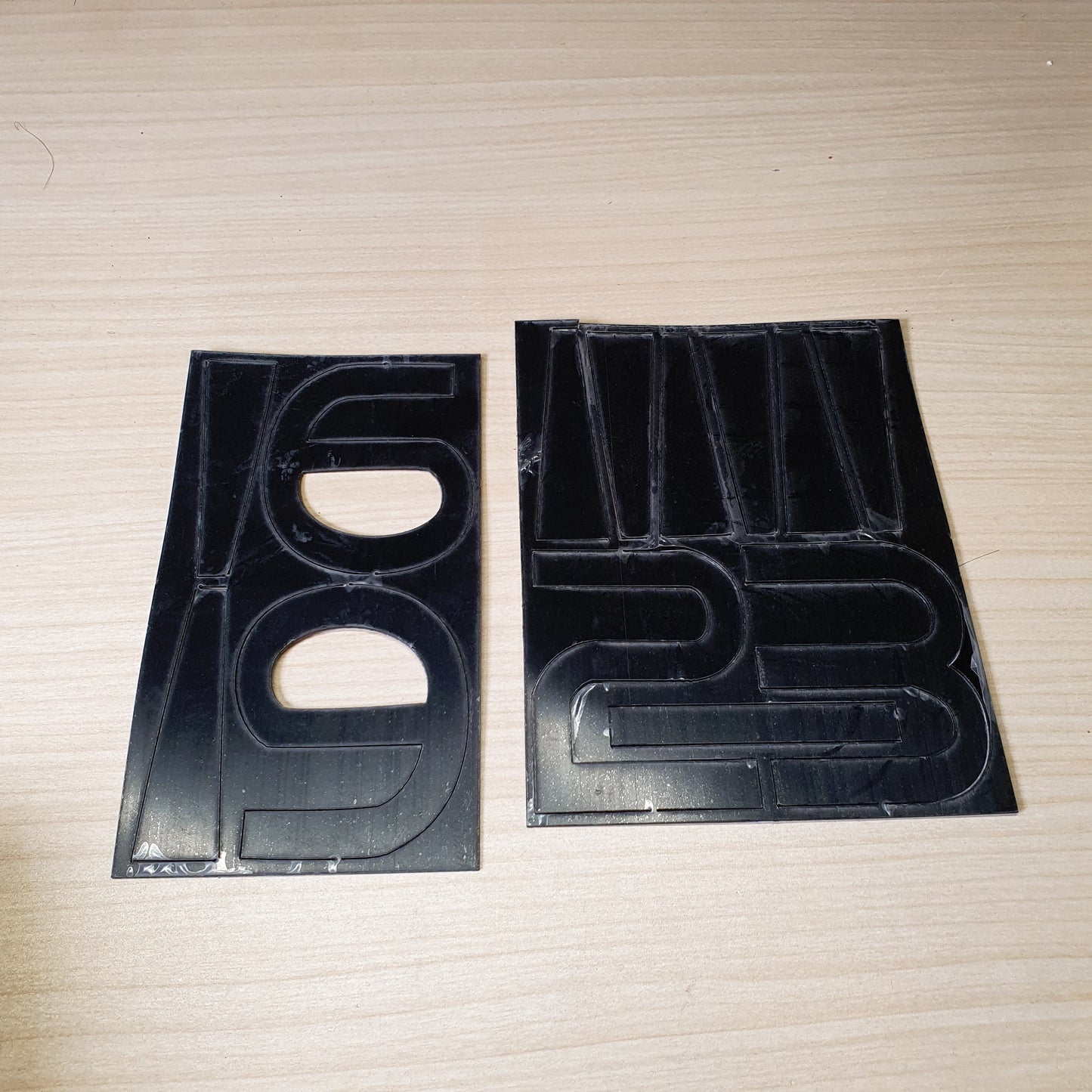 Vinyl adhesive decal sheets featuring numbers for customization. #6981