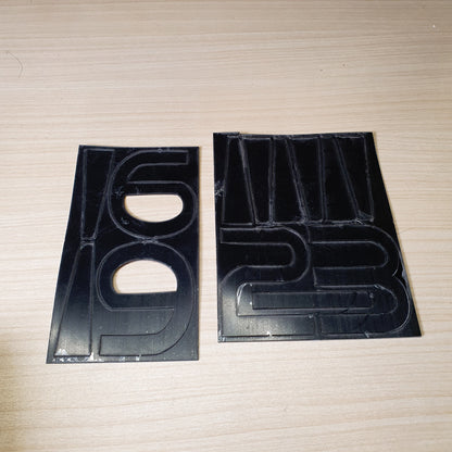 Vinyl adhesive decal sheets featuring numbers for customization. #6981