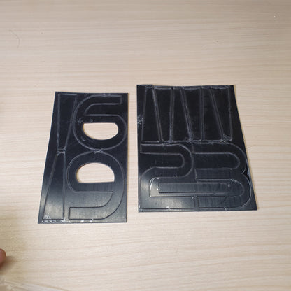 Vinyl adhesive decal sheets featuring numbers for customization. #6981