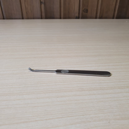 Steel cuticle pusher and trimmer, designed for removing dead skin and cuticles during manicures or pedicures. #6970