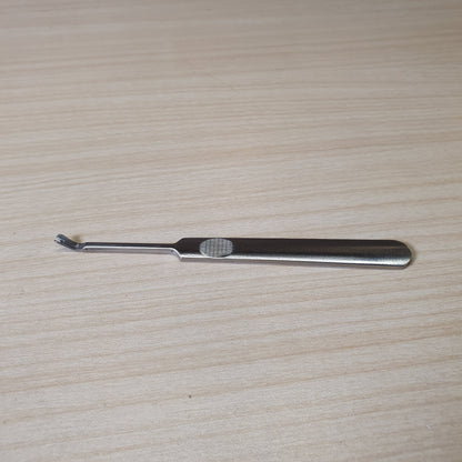 Steel cuticle pusher and trimmer, designed for removing dead skin and cuticles during manicures or pedicures. #6970