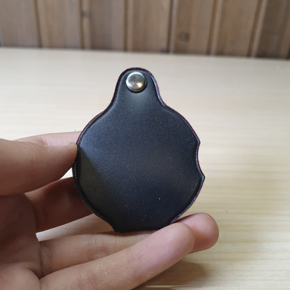 Handheld folding magnifying glass features a black protective pouch that acts as a handle #6983