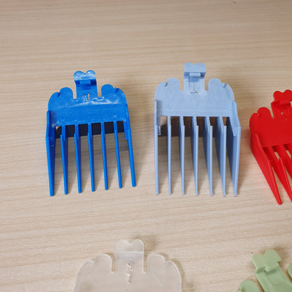 Colorful plastic limit combs designed to fit on professional hair clippers and trimmers.#6932