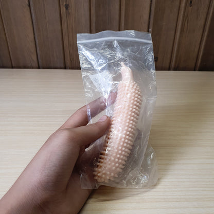 Flexible, spiky dog chew toy shaped like a cucumber or banana, designed for interactive training and teeth grinding. #6966
