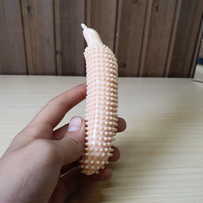 Flexible, spiky dog chew toy shaped like a cucumber or banana, designed for interactive training and teeth grinding. #6966