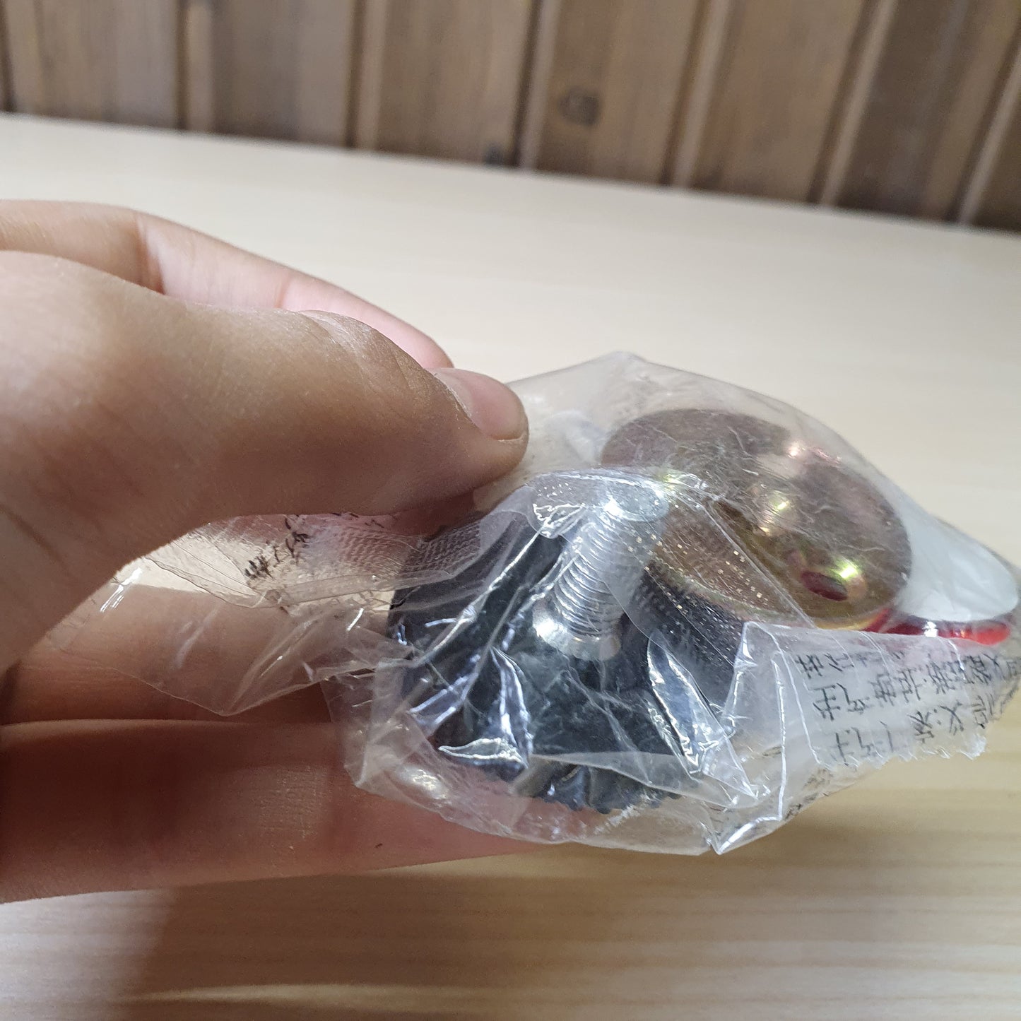 3-hole flange tee nuts used for securing furniture legs or connecting wood pieces. #6898
