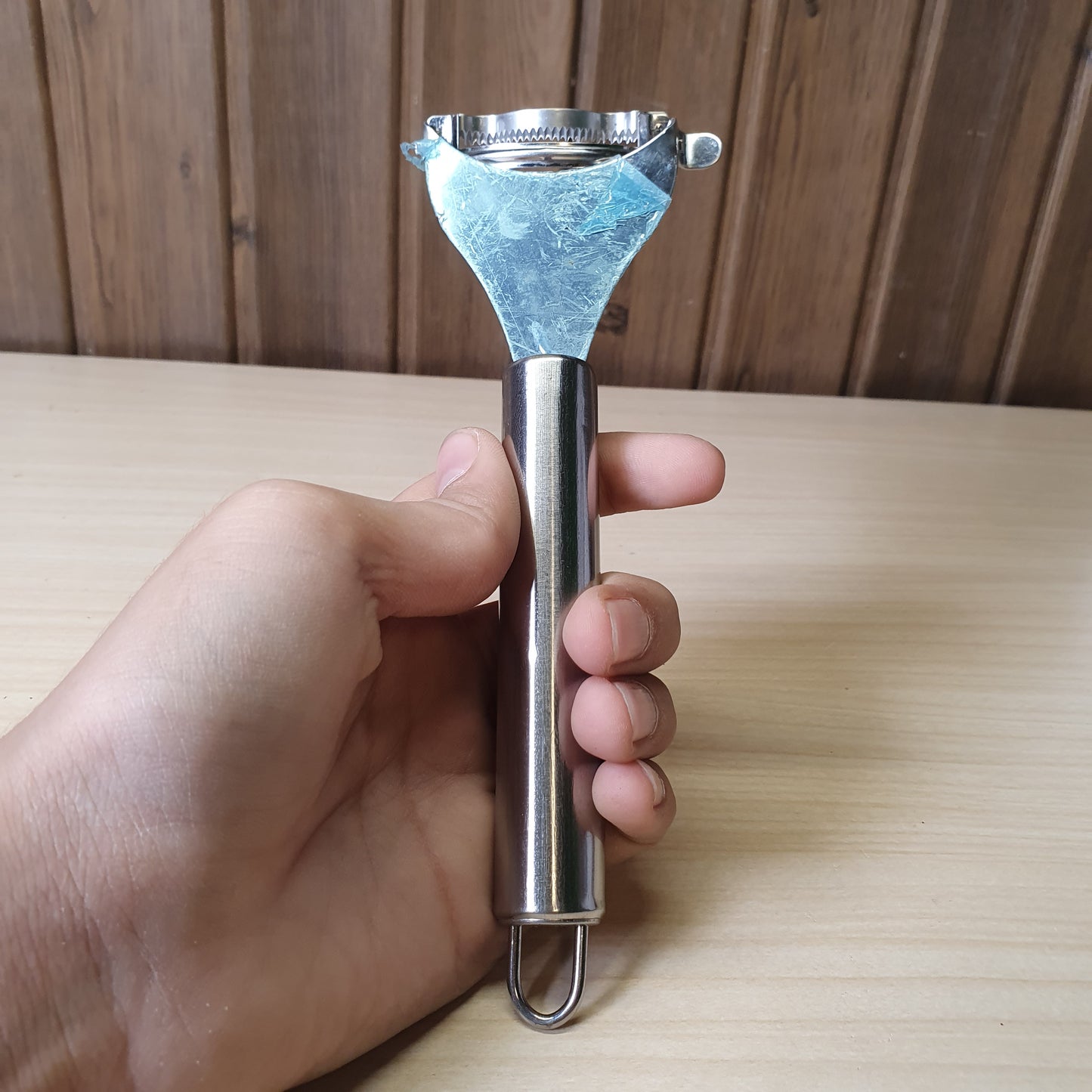 Stainless steel corn peeler or stripper designed to quickly remove kernels from the cob.#6884