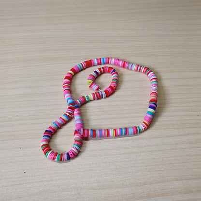 Pink polymer clay Heishi disc beads commonly used for jewelry making.#6951