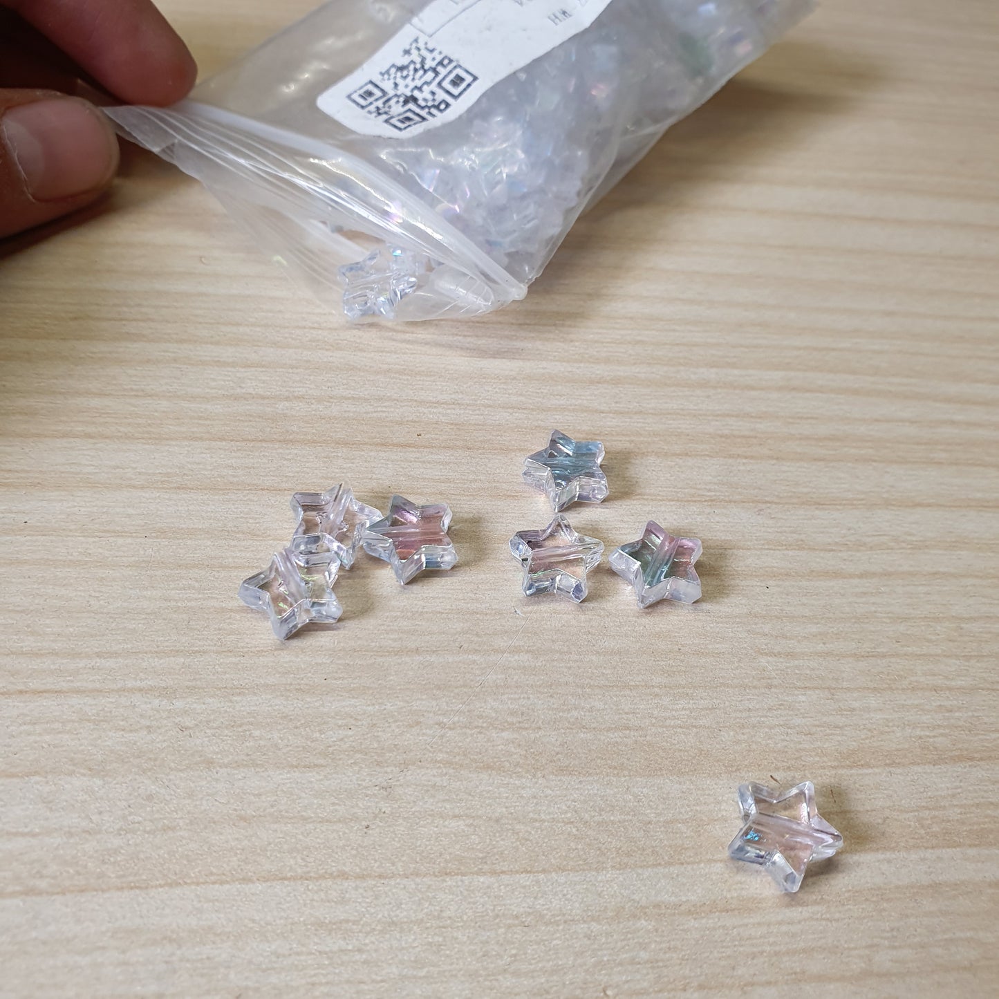Transparent acrylic star beads, often used for DIY jewelry projects like necklaces and bracelets. #6952