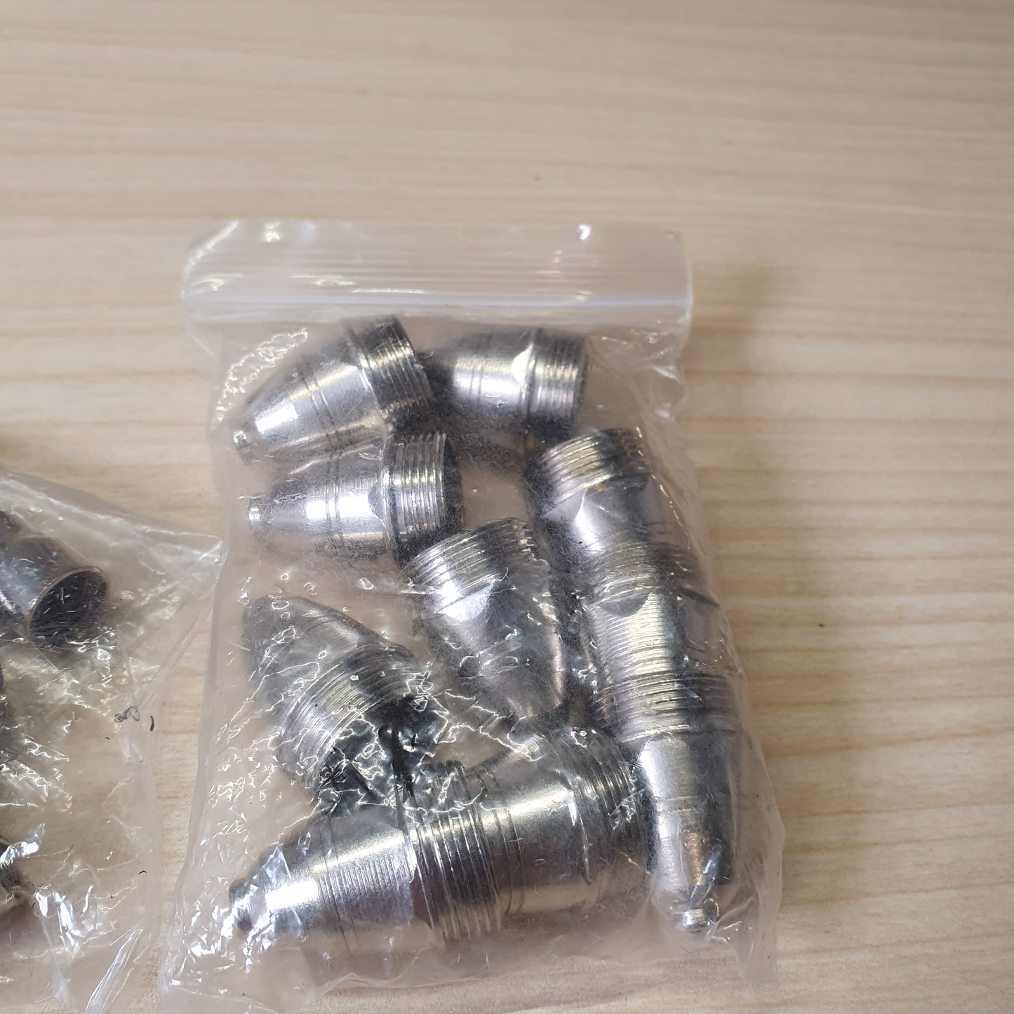 P80 plasma cutting torch consumables, specifically the nozzle tips.#6500
