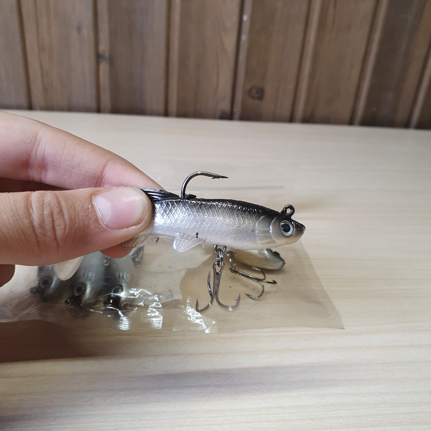 Soft PVC fishing lure with a bionic fish shape, lifelike 3D eyes, and realistic scale design.#6873