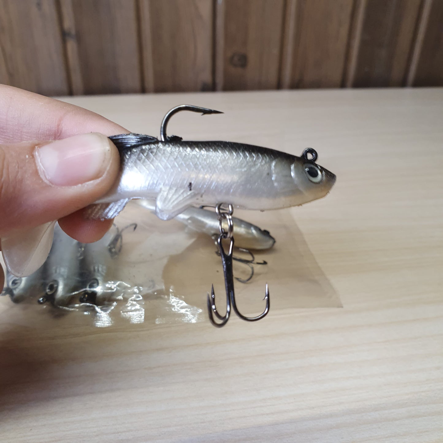 Soft PVC fishing lure with a bionic fish shape, lifelike 3D eyes, and realistic scale design.#6873