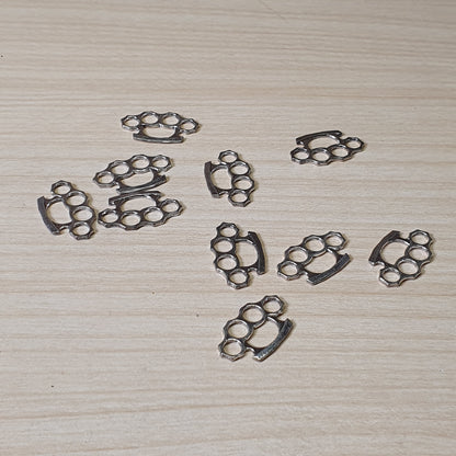 Brass knuckle dusters, often used for jewelry making or crafting #6993