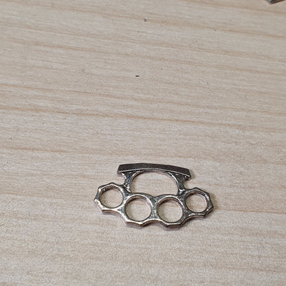 Brass knuckle dusters, often used for jewelry making or crafting #6993