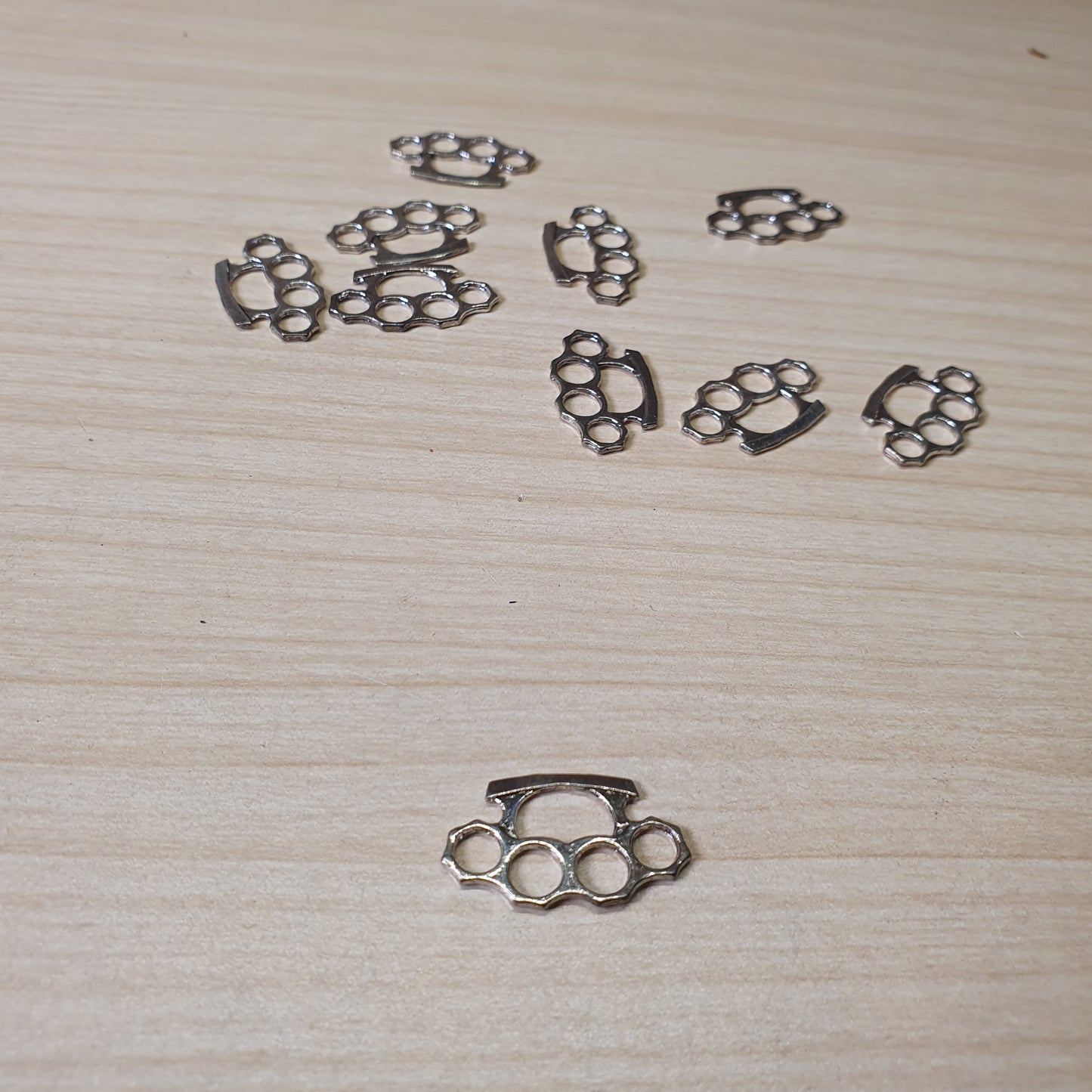 Brass knuckle dusters, often used for jewelry making or crafting #6993