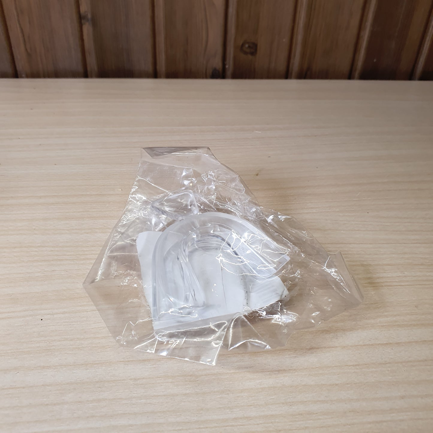 Clear plastic trays are designed for teeth whitening and bruxism protection, allowing you to create a custom mold by softening them in hot water. #6872