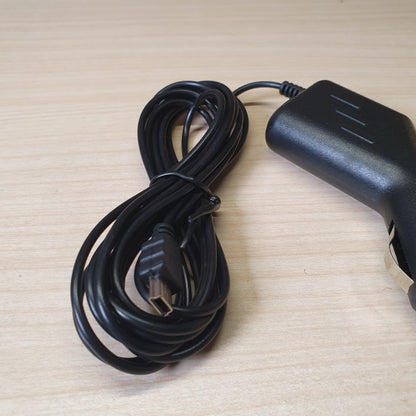 Black car charger adapter features a straight-plug cigarette lighter connector and a built-in, coiled cable. #6816