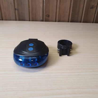 Generic-style rear bicycle safety light features 5 LED lights and 2 laser beams.#6863
