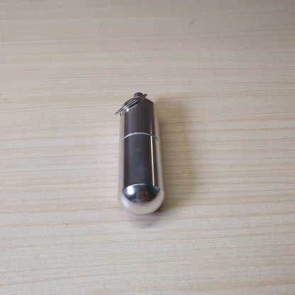 Waterproof aluminum alloy pill container featuring a screw-top lid with a silicone seal and a keyring attachment. #6960